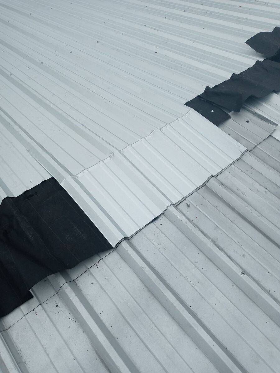 Standing-seam metal roof panels on the Goodyear Building — Bell Engineering & Construction