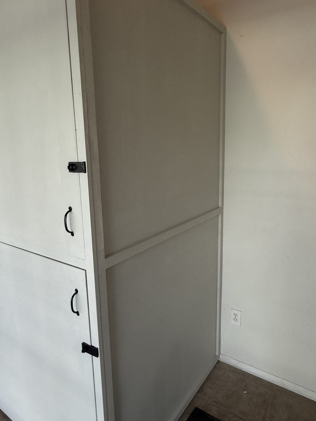 Finished locker end elevation, painted flush to the wall line — Bell Engineering & Construction